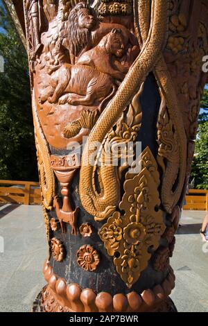 engraving wood art Wat Phra That Doi Suthep temple, Thailand Chiang Mai, buddhism buddhists people leave offers Stock Photo