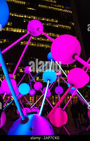 'Affinity' light sculpture by Amigo & Amigo and S1T2, Canary Wharf Winter Lights Festival 2020, London, UK Stock Photo