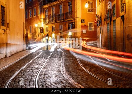 Lisbon, Portugal - Light trails from moving cars and trams along the street Stock Photo