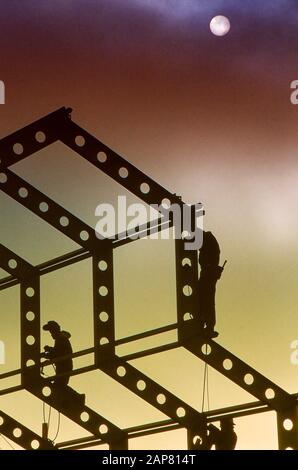 Welder working on steel girders or beams Stock Photo