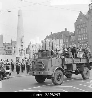 Liberation Day, the liberation army as it entered 20 years ago from the Berlagebrug, the cars at Dam Dam Date: 5 May 1965 Location: Amsterdam, Noord-Holland Keywords: Cars, liberation armies Stock Photo