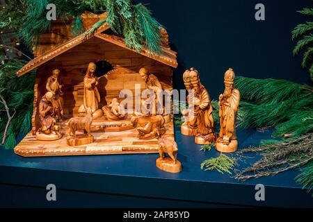 Wooden nativity on display in the holidays around the world exhibit at the Frederik Meijer Gardens Stock Photo