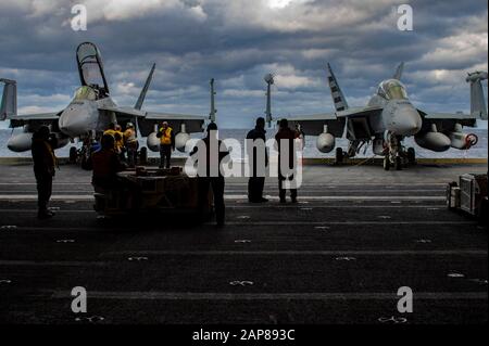 ATLANTIC OCEAN (Jan. 21, 2020) An F/A-18F Super Hornet, left, and an E/A-18G Growler, assigned to Air Test and Evaluation Squadron (VX) 23, are positioned on one of USS Gerald R. Ford's (CVN 78) aircraft elevators prior to being lifted from the hangar bay to the flight deck. Ford is currently conducting Aircraft Compatibility Testing to further test its Electromagnetic Aircraft Launch Systems (EMALS) and Advanced Arresting Gear (AAG). (U.S. Navy photo by Mass Communication Specialist Seaman Jesus O. Aguiar) Stock Photo