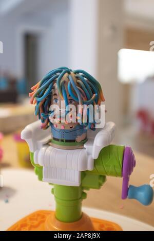 Hairdresser's plasticine toy close up still Stock Photo
