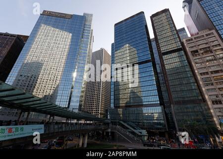 Reflections of Hong Kong in office building windows in central Hong Kong , Connaught Road Stock Photo