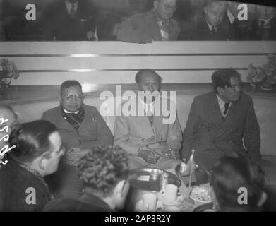 Arrival New Guinea delegation from the United States of Indonesia at Schiphol. Vlnr. Kasima (chairman of the Catholic Party), Soekiman (chairman Masjoemi) and Yamin (independent member of parliament) Date: 30 October 1950 Location: Noord-Holland, Schiphol Keywords: arrivals, delegations, politicians, airports Personal name: Kasimo, Sukiman Stock Photo