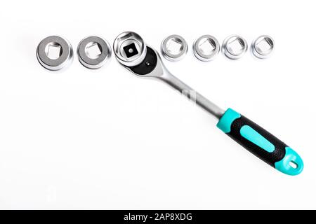 Ratchet wrench. Steel made no skid threaded handle hold firmly without slipping. Universal socket sets. Can be used in hard to reach places. Knob for socket wrench nut ratchet close up. Ratchet tool. Stock Photo