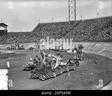 Flower Corso Amsterdam Olympic Stadium Date: September 1, 1956 Location: Amsterdam, Noord-Holland Personal name: Flower Corso Institution name: Olympisch Stadion Stock Photo