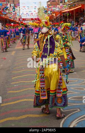 Tinkus dancers in colourful costumes performing at the annual Oruro Carnival. Stock Photo