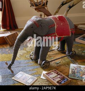 The Nursery at Berrington Hall showing some of the toys donated by local people, including the stuffed pullalong elephant, bricks and books. Stock Photo