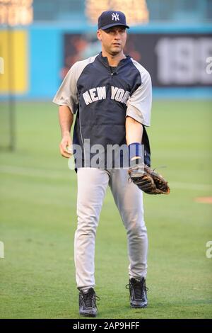 Rays present Derek Jeter with framed Don Zimmer jersey