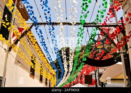 Streets of Sao Vicente decorated with colored paper flowers for a traditional festival (Madeira, Portugal, Europe) Stock Photo