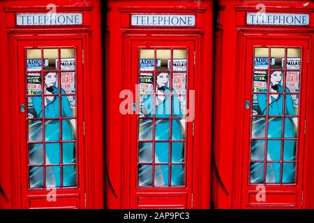 Red Telephone box, money box, London, England.