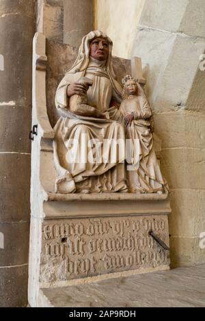 Magdeburg, Germany. 20th Jan, 2020. View of a side altar in Magdeburg Cathedral with the sandstone figure 'Anna Selbdritt', the mother of Mary. She holds Mary and the baby Jesus on her lap. (In 1520 the cathedral construction was finished after 311 years of building time) Credit: Stephan Schulz/dpa-Zentralbild/ZB/dpa/Alamy Live News Stock Photo