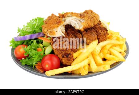 Southern fried chicken and French fries meal with fresh salad isolated on a white background Stock Photo