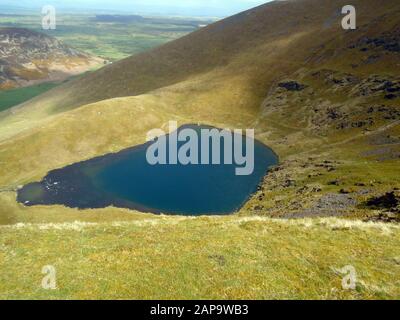 Looking Down on Bowscale Tarn from Tarn Crags on the Path to the Wainwright 'Bowscale Fell', Mosedale, Lake District National Park, Cumbria, England, Stock Photo