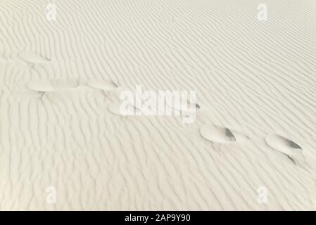 Sand drifts, wave structures with footprints in the white sand, background image, Sylt, North Frisian Island, North Sea, North Frisia Stock Photo