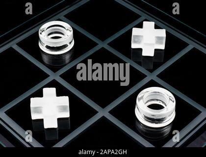 Glass Tic Tac Toe Game On Black Background Stock Photo Alamy
