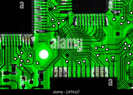 Green transparent circuit board with microchips Stock Photo