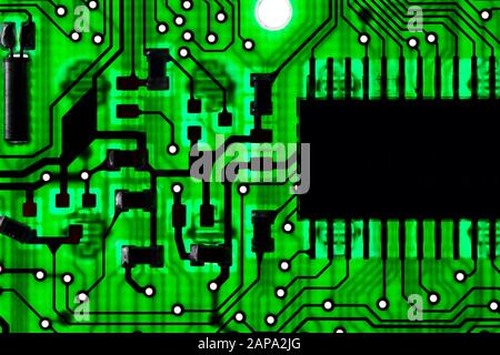 Green transparent circuit board with microchips Stock Photo