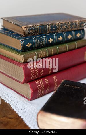 Books on the bedside cabinet in the South Bedroom, The Vyne, Hampshire. Stock Photo