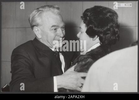After 15 months in East Germany again in the Netherlands. The Amsterdam businessman Theo J. Lenssen, who was arrested last year in Leipzig, has been released. He was arrested at the Leipziger Messe where he had a stand. He was accused of violating customs and foreign exchange provisions. In July 1964, he was sentenced to 22 months' imprisonment with deduction of custody. So he was released eight months earlier than expected. On his arrival at Schiphol, Mrs. Lenssen was present at the airport to greet her husband again after 15 months Date: 25 November 1964 Location: Noord-Holland, Schiphol Key Stock Photo
