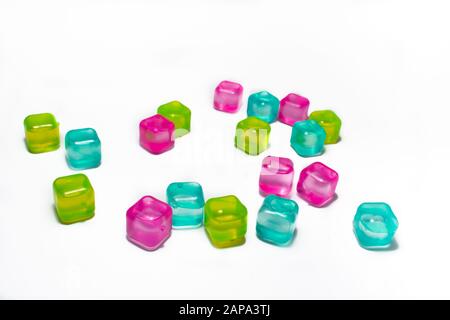 Multicolored cubes filled with liquid, arranged randomly, on a white background Stock Photo