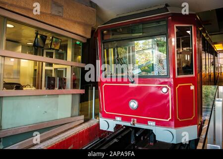 HongKong, China - November, 2019: The Peak Tram. The railway to Victoria Peak, a mountain with view above the city skyline of Hong Kong Stock Photo