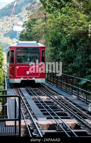 HongKong, China - November, 2019: The Peak Tram. The railway to Victoria Peak, a mountain with view above the city skyline of Hong Kong Stock Photo