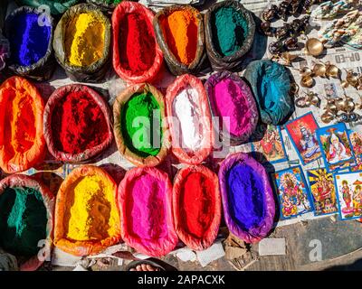 Color powder for the festival Holi and religious rituals, sold in the street markets of town Stock Photo