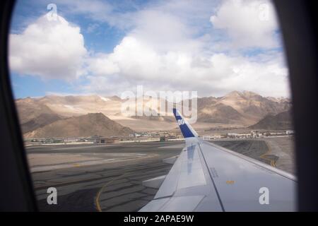 JAMMU KASHMIR, INDIA - MARCH 19 : View landscape himalaya range mountains from airbus landing on runway of Kushok Bakula Rimpochee Airport at Leh Lada Stock Photo