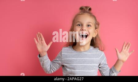 Happy surprised woman screaming with open hands, girl yell Stock Photo