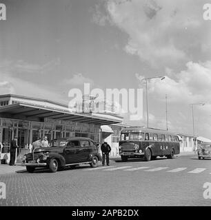 Schiphol and corporate identity KLM Description: Schiphol Airport with the main entrance and departure hall, in the background the tower of traffic control Date: August 1951 Location: Noord-Holland, Oud-Schiphol Keywords: arrival and departure halls, cars, buses, traffic towers, airports Stock Photo