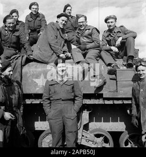 Front North-East Netherlands: Enschede - Hengelo [battle and liberation Achterhoek (April 1, 1945), Enschede (April 1, 1945), Hengelo (April 3, 1945)] Description: Canadian soldiers at rest Date: April 1945 Keywords: military, tanks, World War II Stock Photo