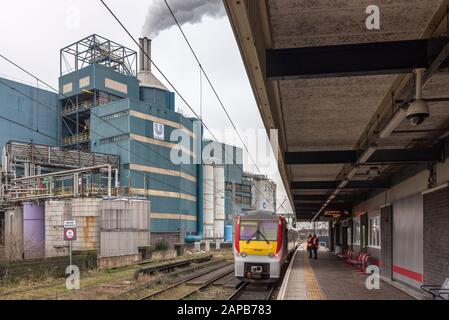 Warrington Bank Quay Station With The Unilever Factory Behind Stock ...