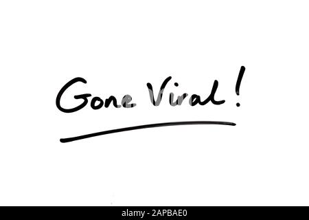 Close-up of the phrase Gone Viral! handwritten on a white background. Stock Photo