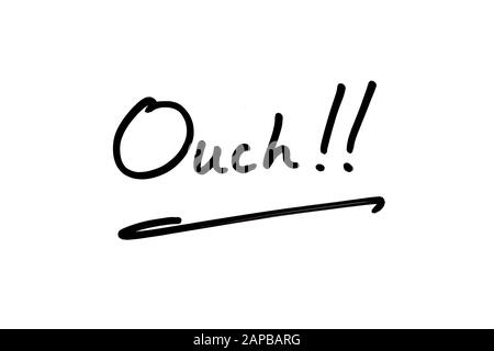Close-up of the word Ouch!! handwritten on a white background. Stock Photo