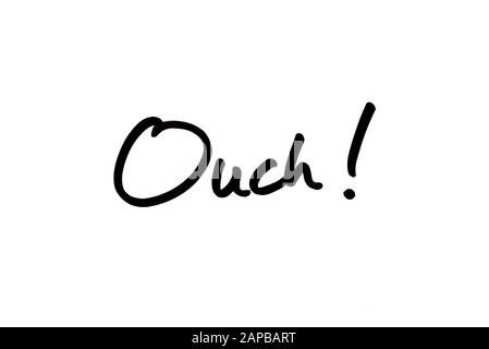 Close-up of the word Ouch! handwritten on a white background. Stock Photo