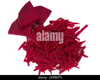 Three pieces of beetroot and grated beets on white background Stock Photo