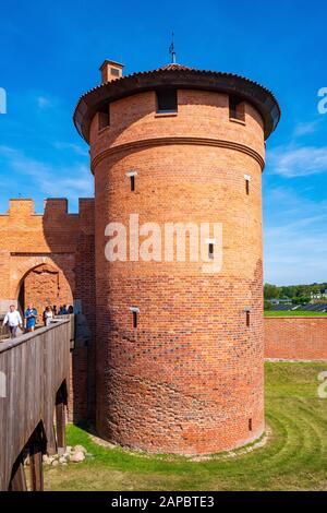 Malbork, Pomerania / Poland - 2019/08/24: Panoramic view of the medieval Teutonic Order Castle in Malbork, Poland - external defense walls with lower Stock Photo