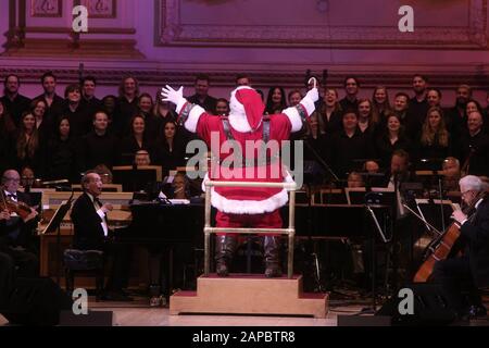 A performance of New York Pops: A Frank and Ella Christmas at Carnegie Hall. Featuring: Santa Claus Where: New York, New York, United States When: 22 Dec 2019 Credit: Joseph Marzullo/WENN.com Stock Photo