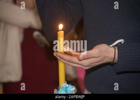 Baptism ceremony of baby boy in local Orthodox church Stock Photo