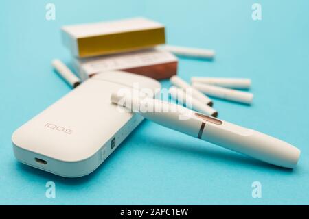 St. Petersburg, Russia - 08.08.2019: Iqos is an innovative tobacco heating system, an alternative to traditional and electronic cigarettes. The photo Stock Photo