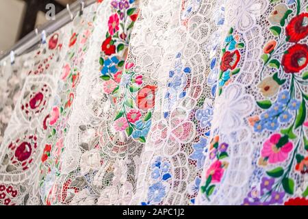 Flower cotton handmade scarf composition background at Budapest, Hungary. Stock Photo