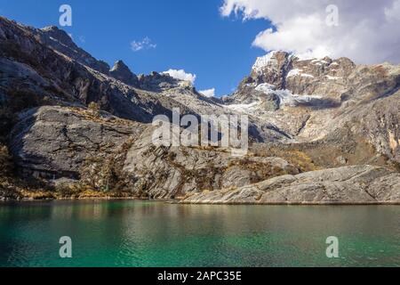 Mountain and green lake in the Huascarán National Park in Peru. Stock Photo