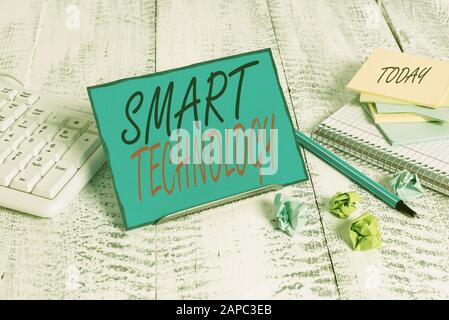 Handwriting text Smart Technology. Conceptual photo used to protect and prevent errors in hard drives Notepaper stand on buffer wire in between comput Stock Photo