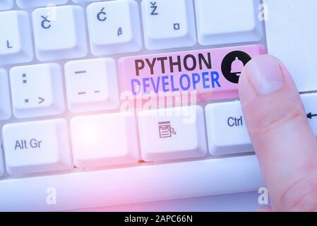Handwriting text Python Developer. Conceptual photo responsible for writing serverside web application logic Stock Photo