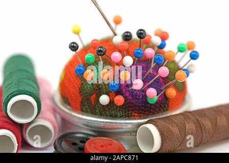 Close-up of pins in the pincushion Stock Photo