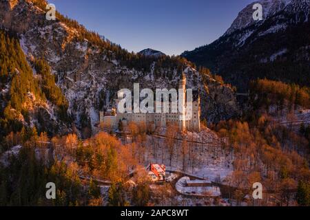 Neuschwanstein castle before sunset in Winter, Germany Stock Photo