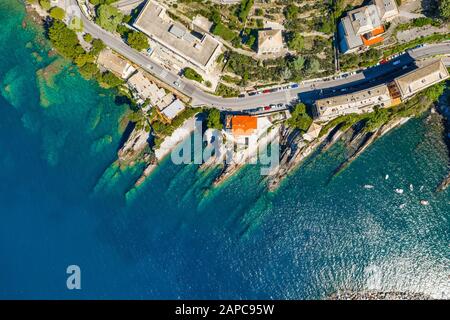 Rocky bay in Italy. Aerial drone view on Adriatic sea beach, Camogli, liguria. Stock Photo